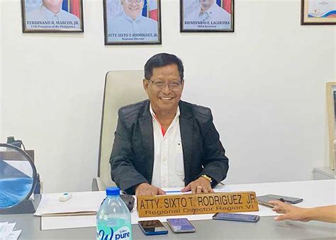 DOLE unveils marker for Region 6 Testing and Coaching Center.
